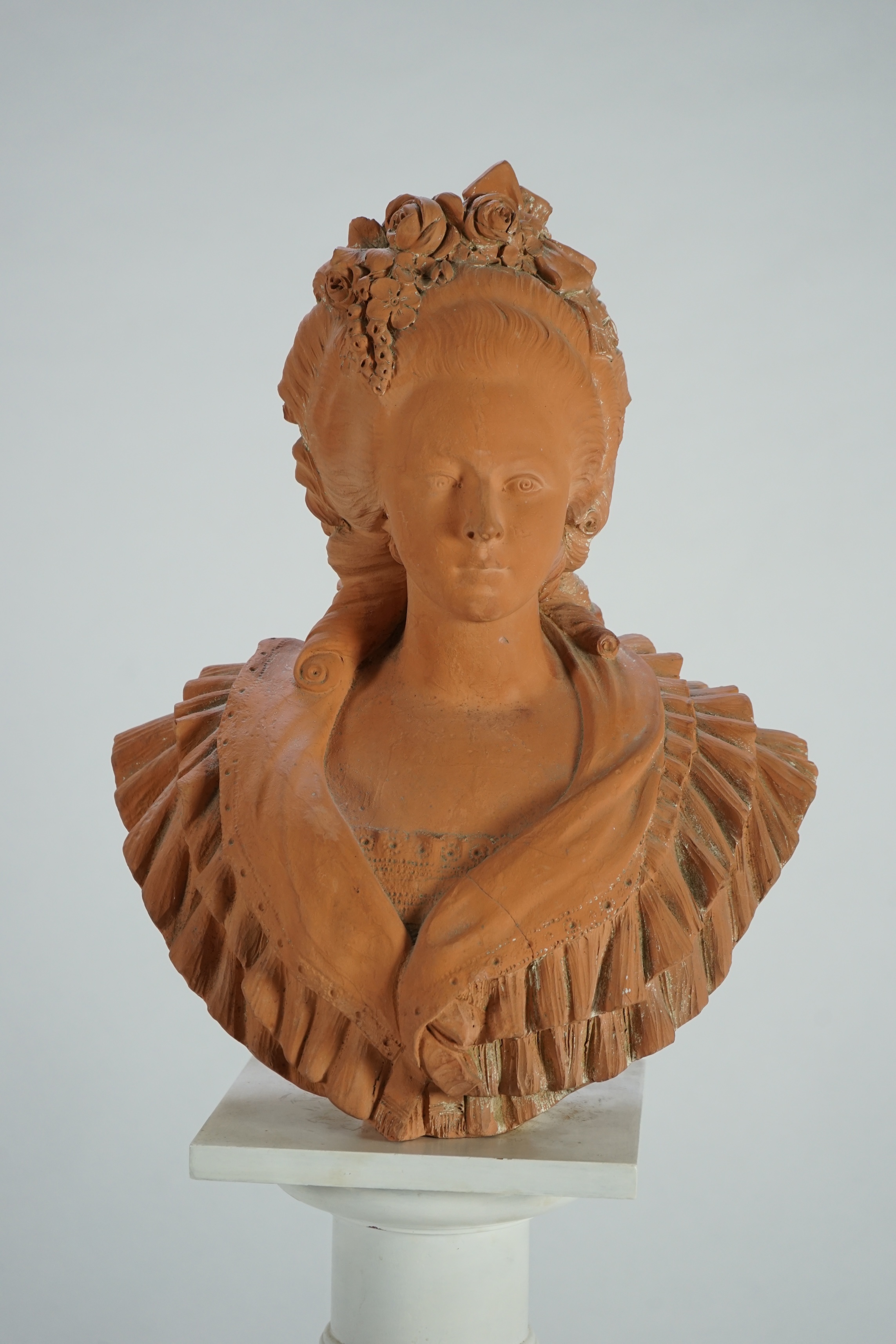 An early 20th century French terracotta bust of Marie Antoinette